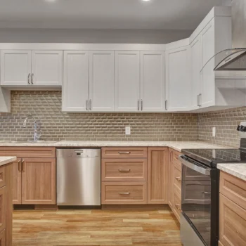 St. Brieux Manor kitchen with two tone cabinets