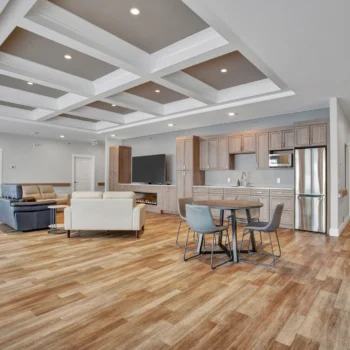 St. Brieux Manor open activity room with seating